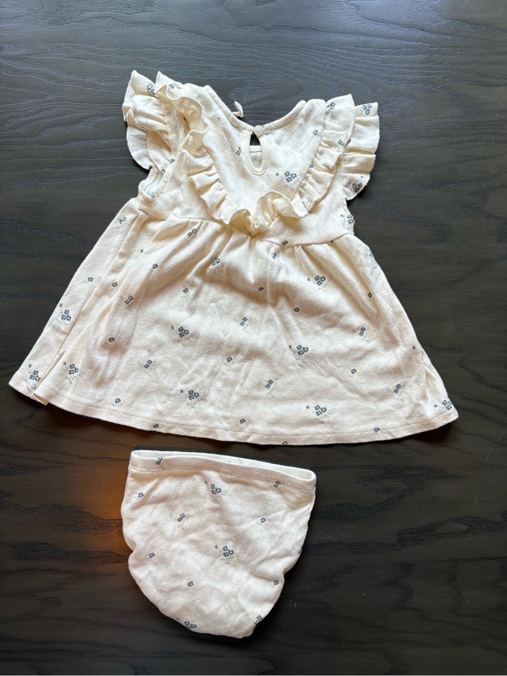 Quincy Mae Cream Baby Onesie with Small Muted Floral Print